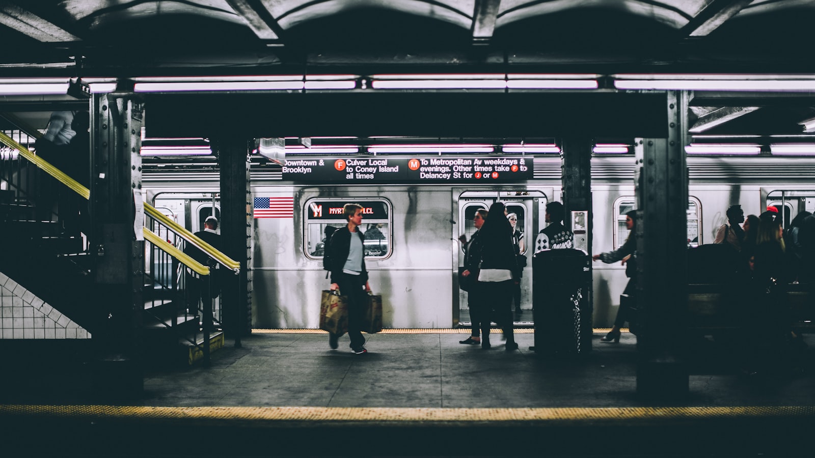 People standing near train