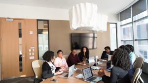 Photography of people inside room during daytime